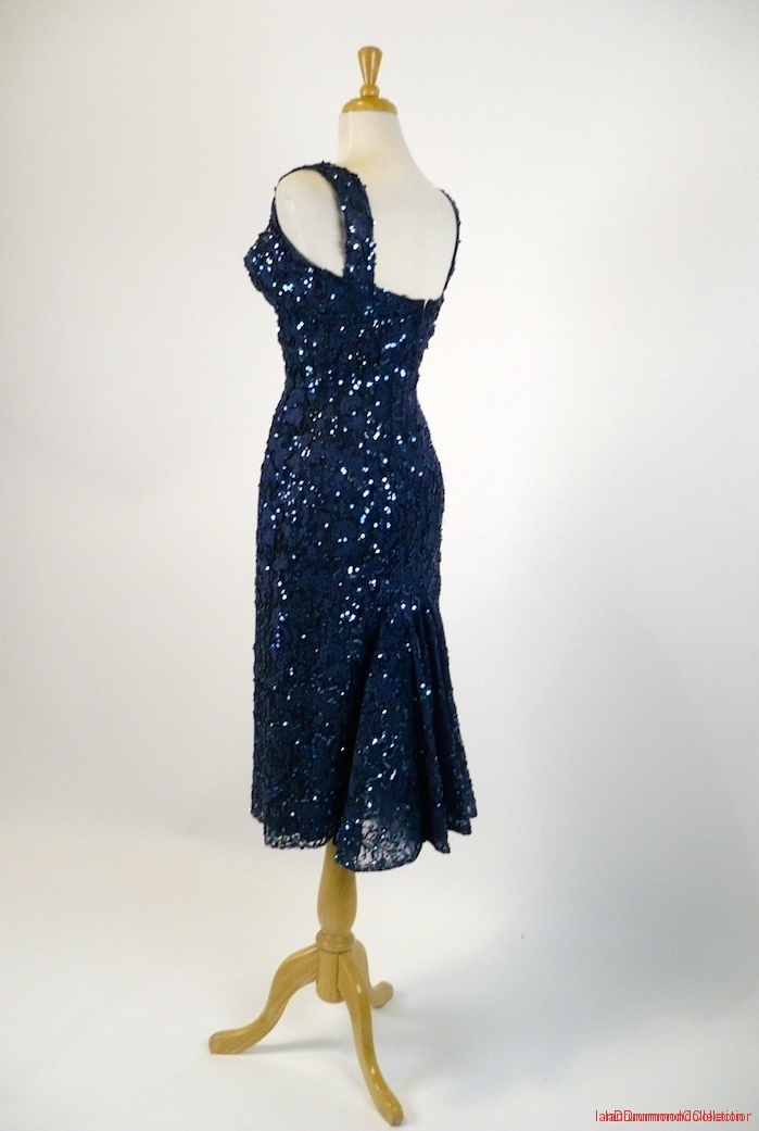1950's Cocktail Dress, deep blue lace wsequin trim fishtail back - three-quarter view showing flare.jpg