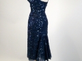 1950's Cocktail Dress, deep blue lace wsequin trim fishtail back - three-quarter view showing flare.jpg